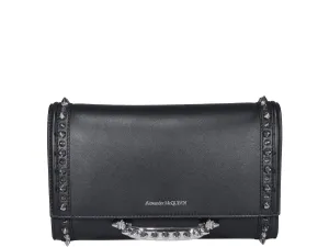 Alexander McQueen Logo Debossed Studded Clutch Bag