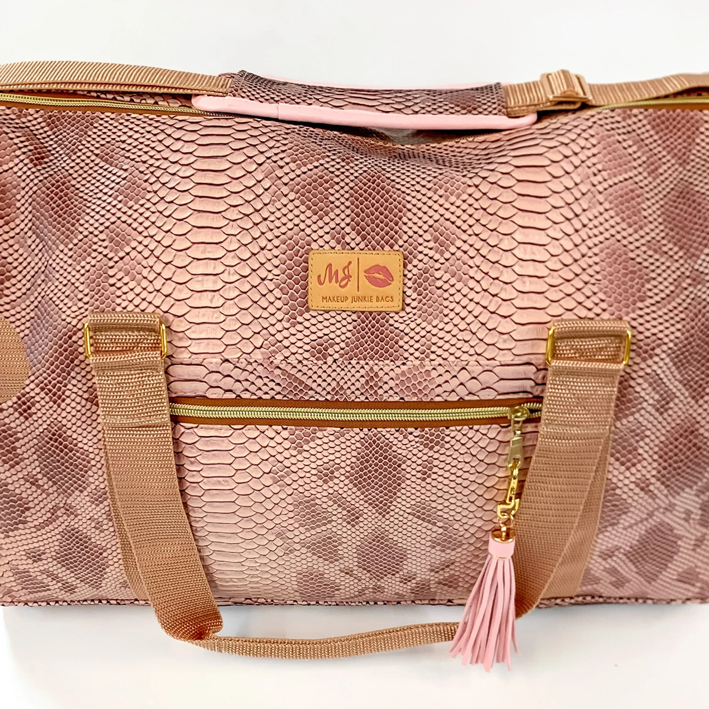 Makeup Junkie | Copperazzi Duffel Bag in Dusty Pink Snake Print