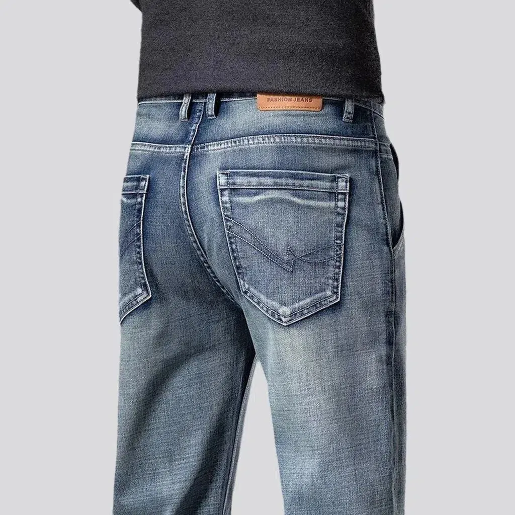 Stonewashed men's sanded jeans