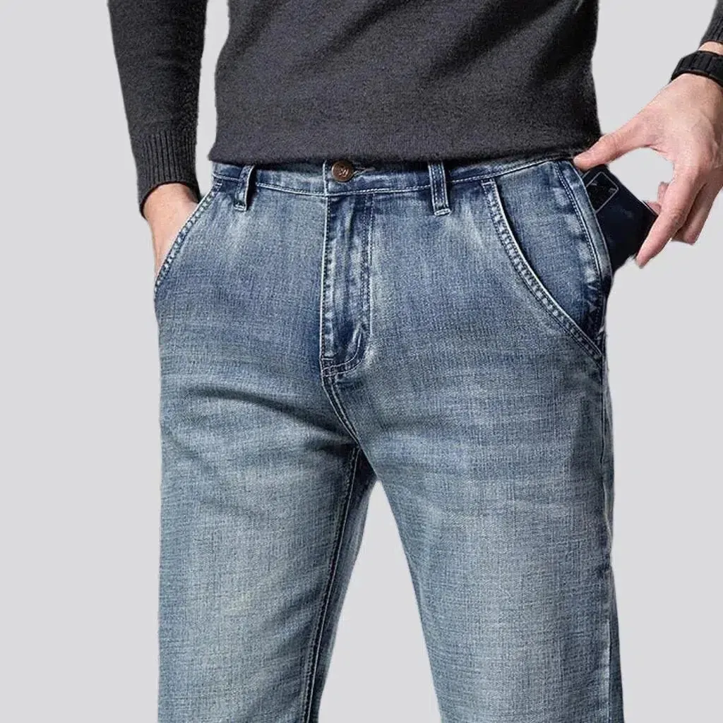 Stonewashed men's sanded jeans