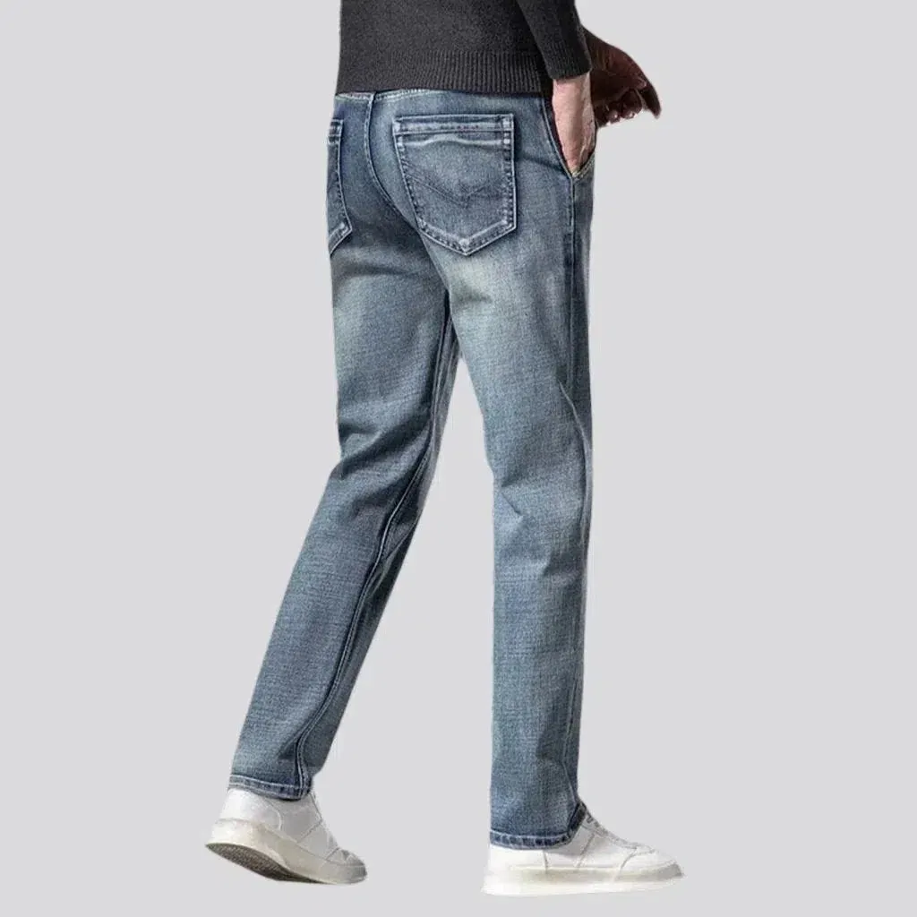 Stonewashed men's sanded jeans