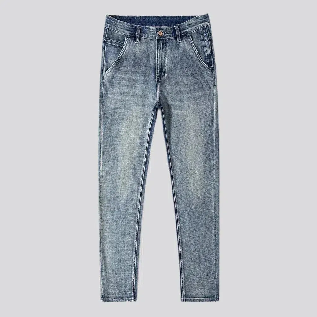 Stonewashed men's sanded jeans